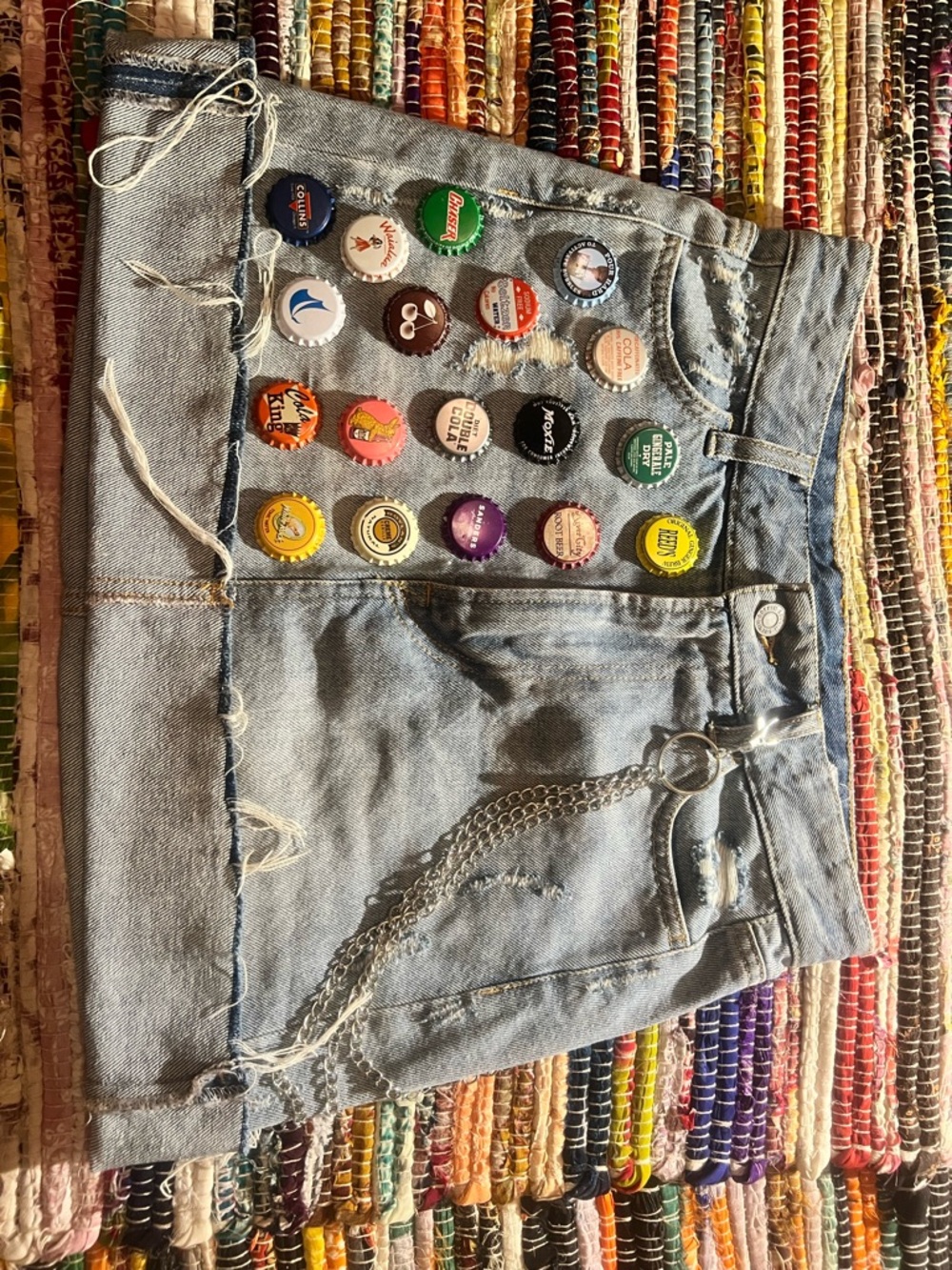 Women's Light Wash Denim High-Low Mini Skirt with Pin Accents